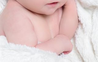 a newborn after skin editing