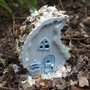 Fairy Photography West Sussex a fairy house on my studio pathway with a shell roof