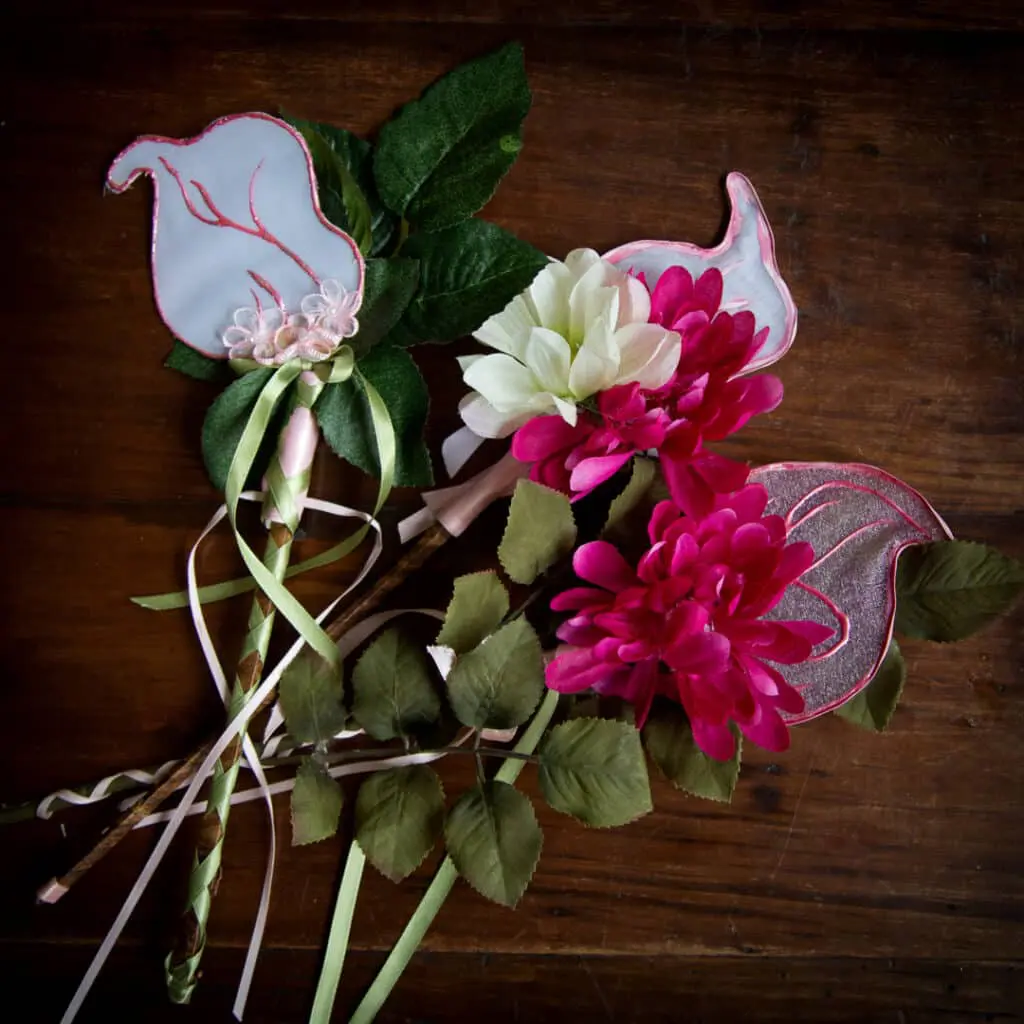 a collection of flower themed fairy wands for my fairy themed photo shoots