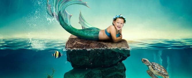 A little girl poses for a mermaid digital artwork
