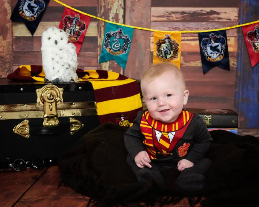 a little boy at a Harry Potter themed professional photo shoot