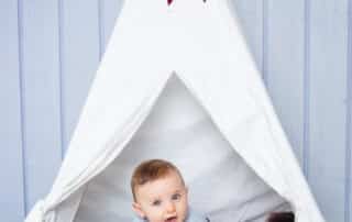 a little boy in my wild one teepee set up in my crawley down studio