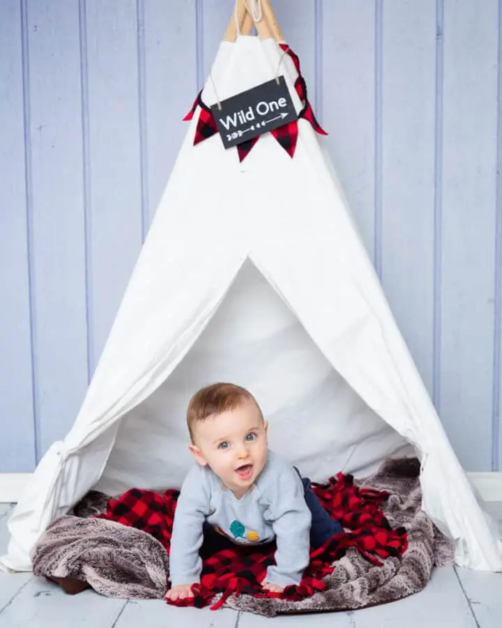 a little boy in my wild one teepee set up in my crawley down studio