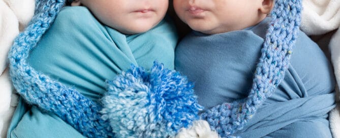 sleeping twin babies in the studio