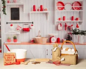 a red and white christmas themed kitchen as a festive photo shoot set