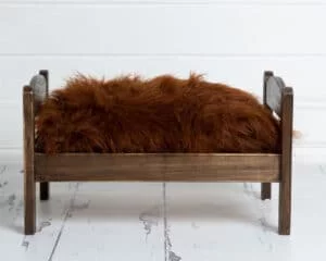 dark wooden bed prop