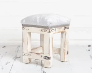 white vintage footstool studio prop