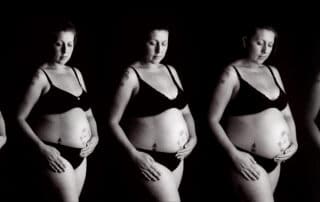 a series of pictures of the same pregnant woman as her bump grows over time