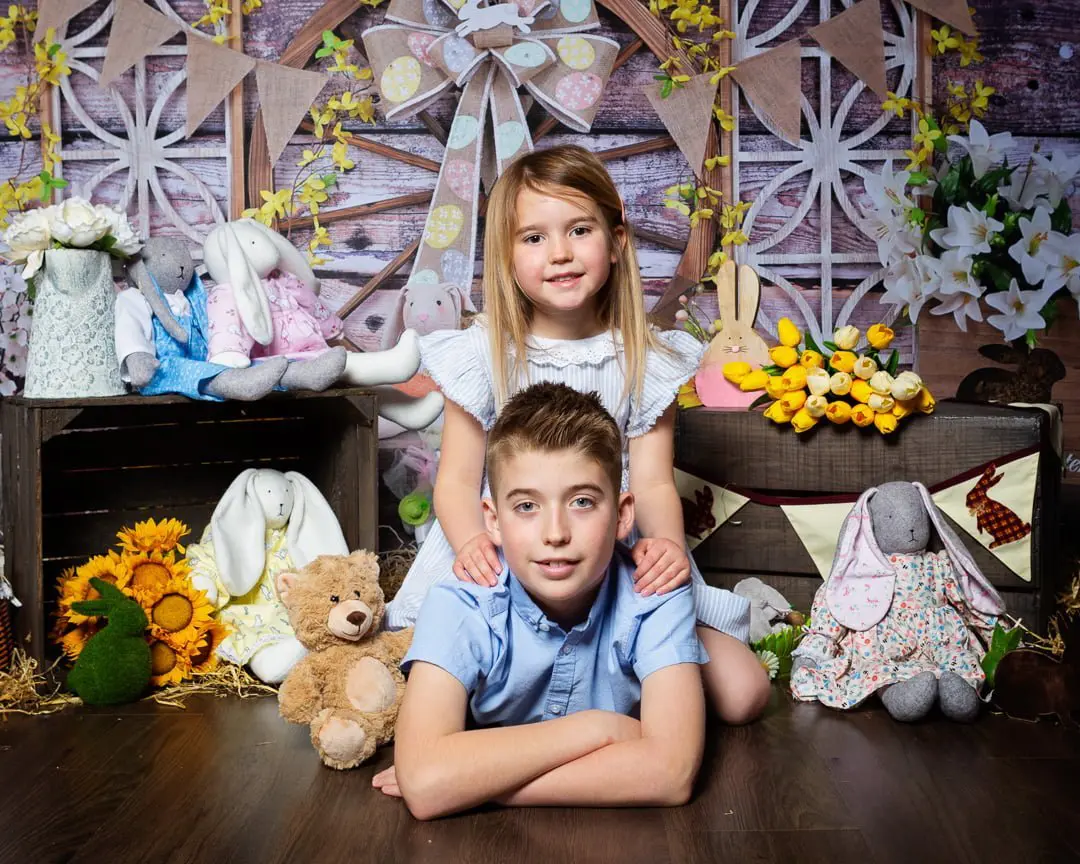 Easter Photo Shoots West Sussex 2022 two children pose at an Easter themed photo shoot at my studio