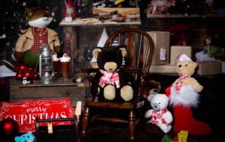a santa's workshop christmas themed photo shoot set
