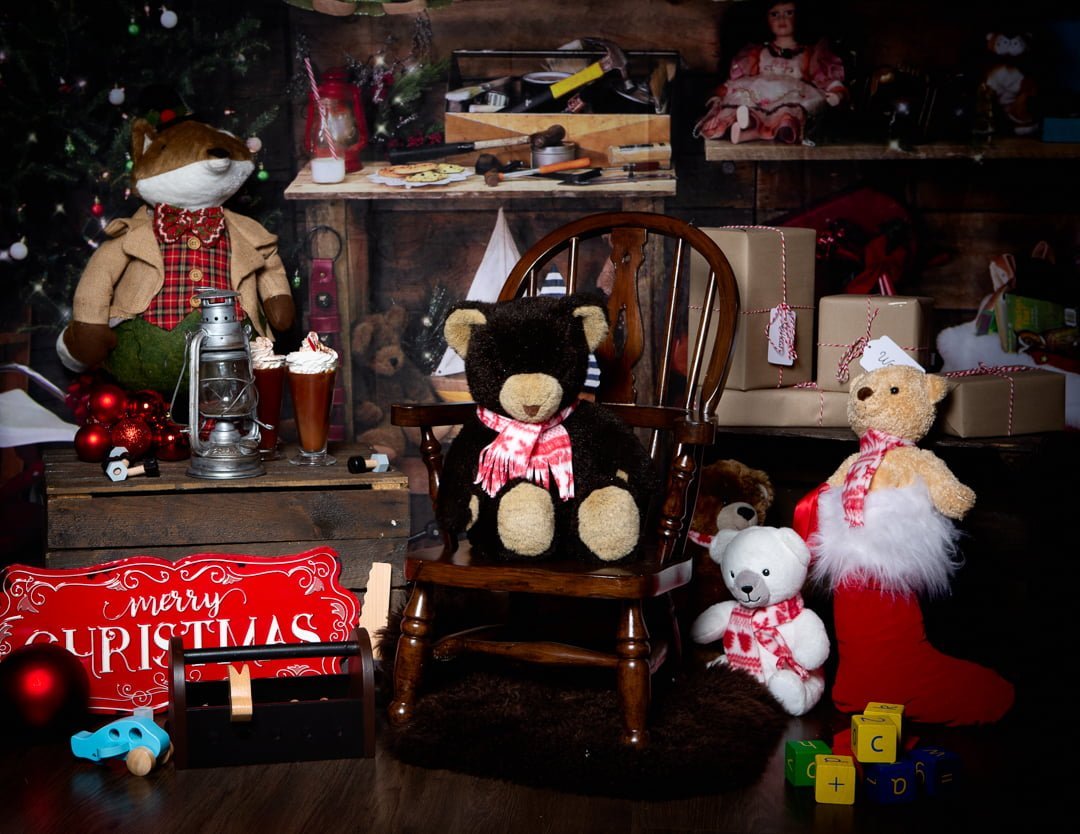 a santa's workshop christmas themed photo shoot set
