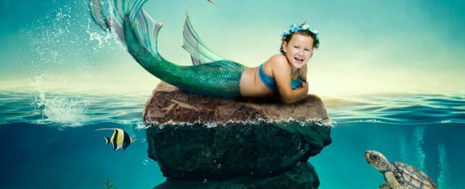 a little girl with short dark hair in a digital mermaid photo