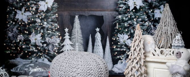a silver, black and navy themed christmas set featuring a fireplace scene
