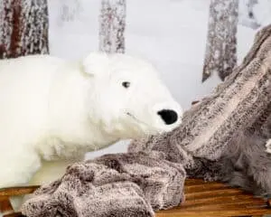 Christmas Photo Shoots West Sussex 2023 a friendly looking giant polar bear toy smiles for the camera