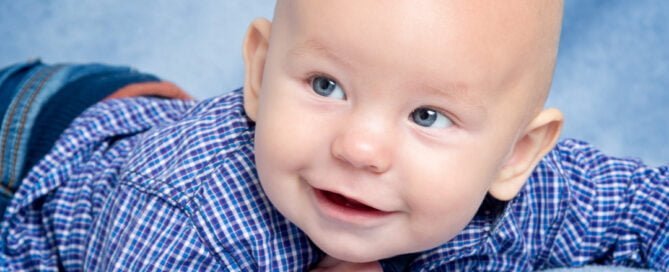 a blue themed baby picture in the studio