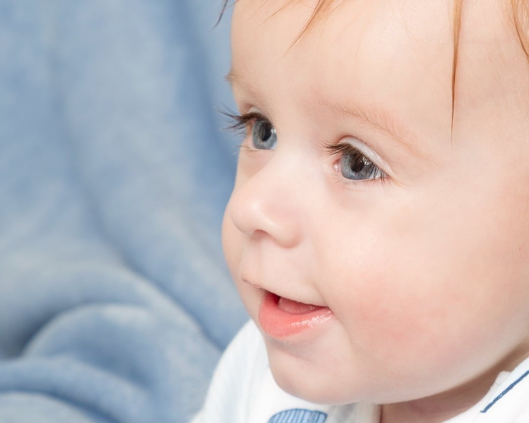 a baby with very long eyelashes