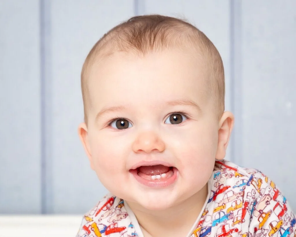 a little boy with a black eye edited out at a photo shoot