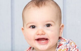 a little boy with a black eye at a photo shoot