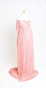 a pink maternity dress on a mannequin