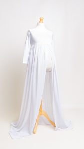 a white sheer maternity dress on a mannequin