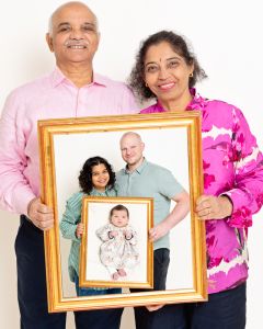 Three generations of one family joined together digitally in one picture frame themed image