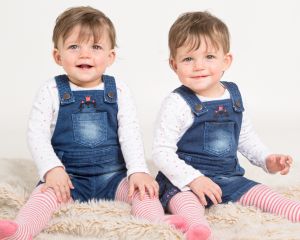 Baby Photography East Grinstead West Sussex Twins dressed in denim smile for the camera