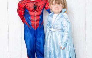 Spiderman and Elsa pose for a photo together