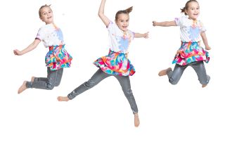 a composite image of a little girl jumping into the air