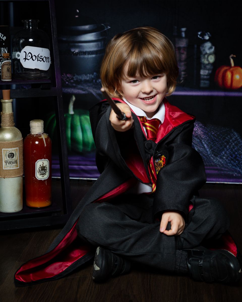 a little boy dressed as Harry Potter at a halloween photo shoot in west sussex