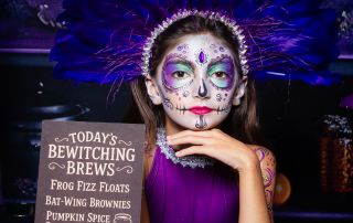 a girl in face paint halloween photo shoot in west sussex