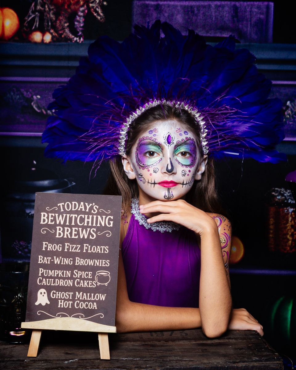 a girl in face paint halloween photo shoot in west sussex