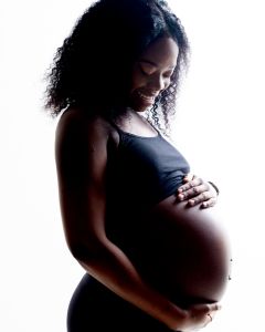 a silhouette style maternity portrait image