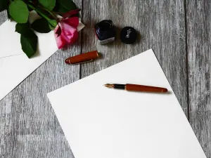Time capsule ideas a pen and paper set out ready to write a letter