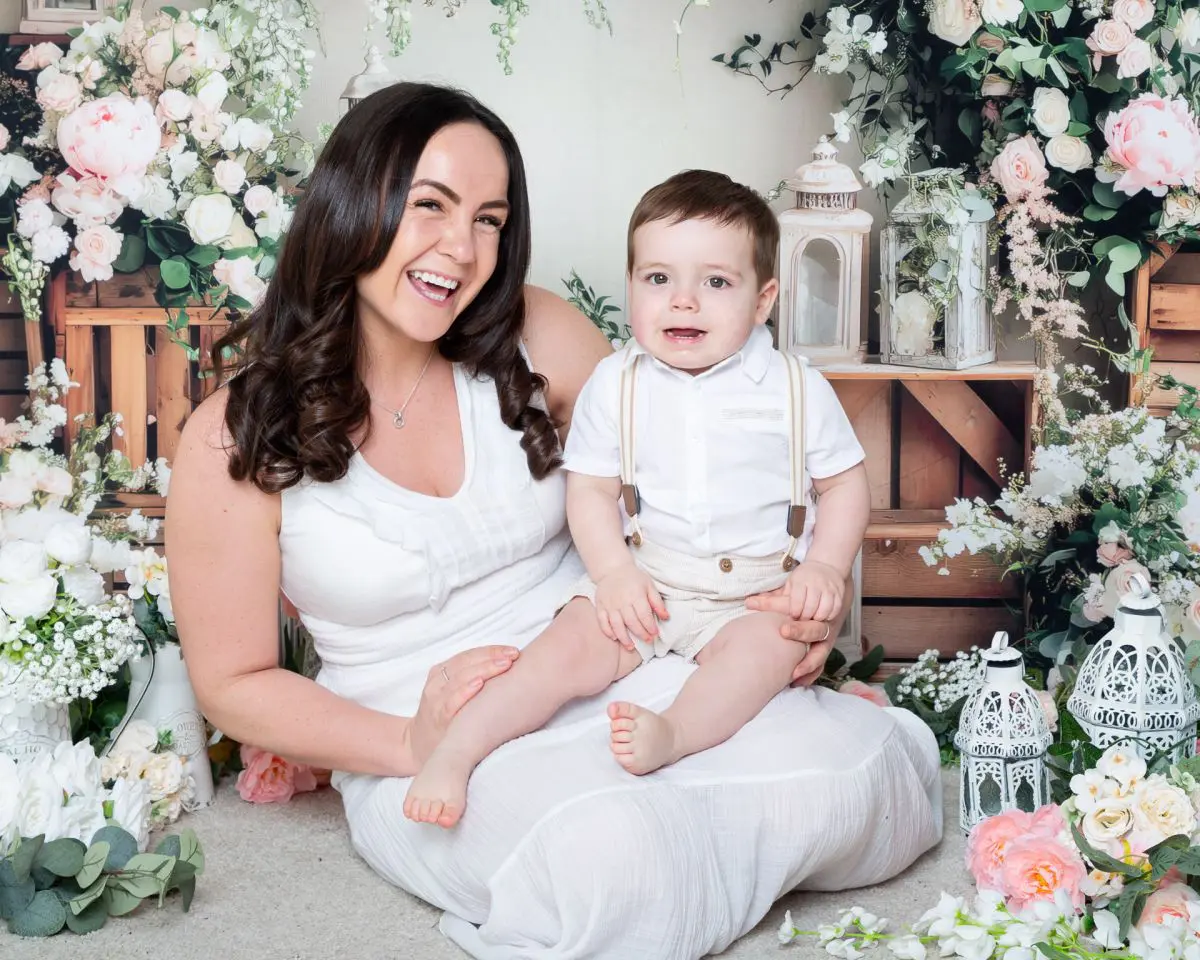 a mum and her son pose at a mother's day photo shoot