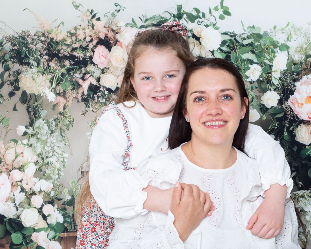 a mum and her daughter pose at a mother's day photo shoot