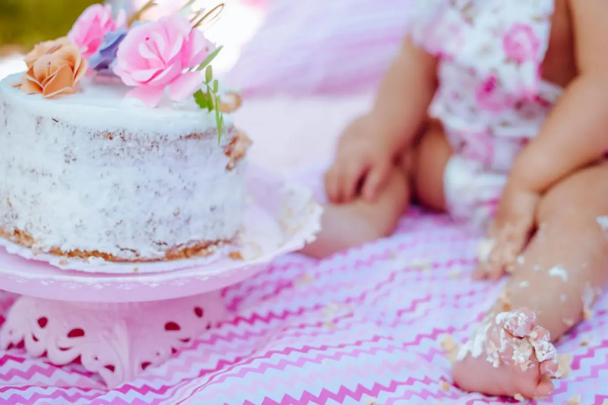 a picture of some icing covered baby toes at a DIY cake smash