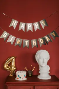 a birthday banner and cake