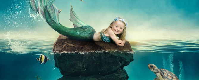 a digital image of a little girl transformed into a mermaid