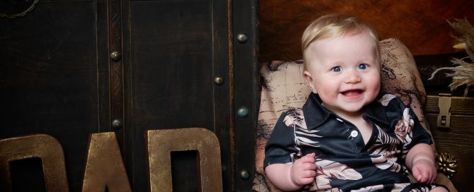 Father's Day photo shoot in west sussex with a little boy in a hawaiian style shirt