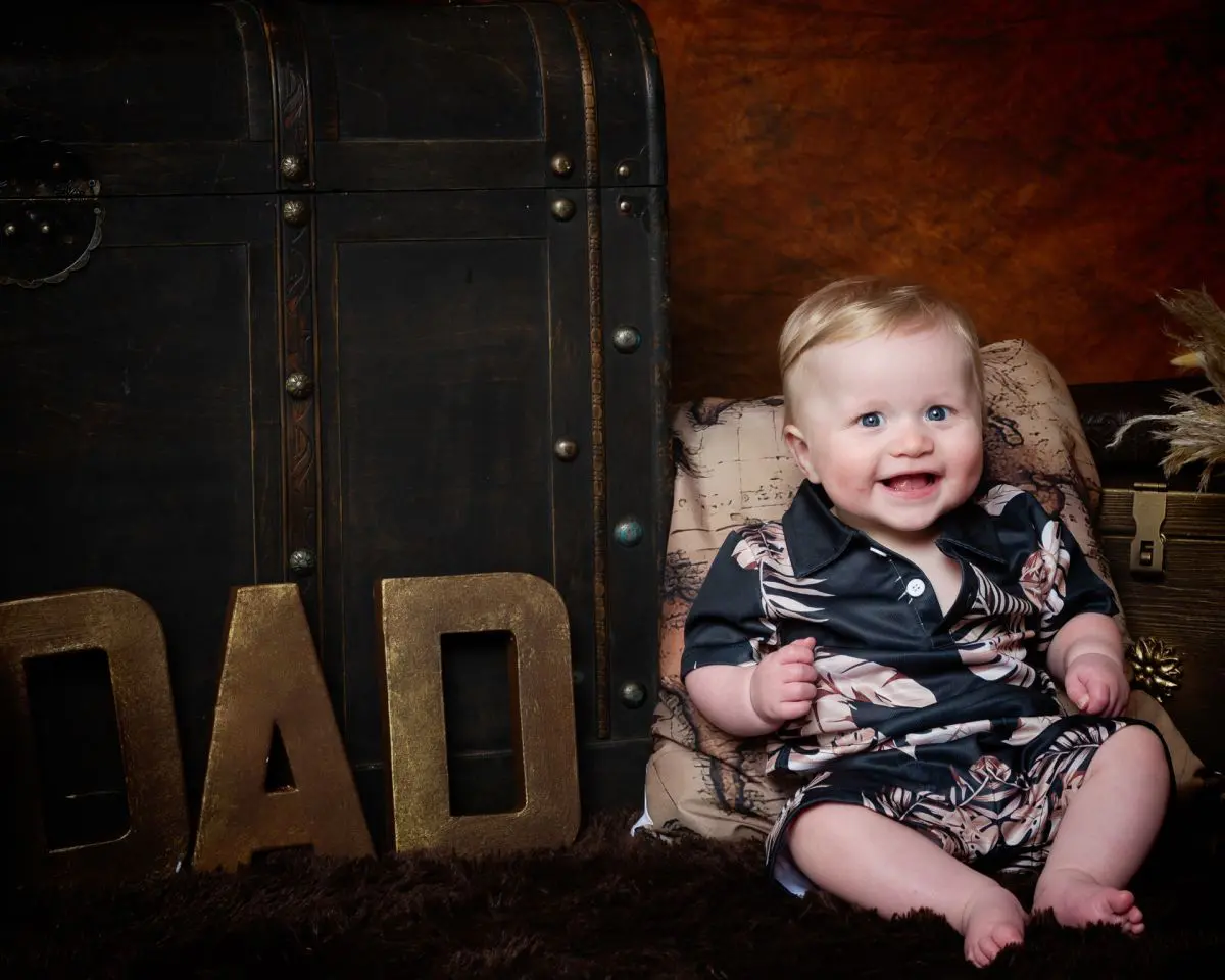 Father's Day photo shoot in west sussex with a little boy in a hawaiian style shirt